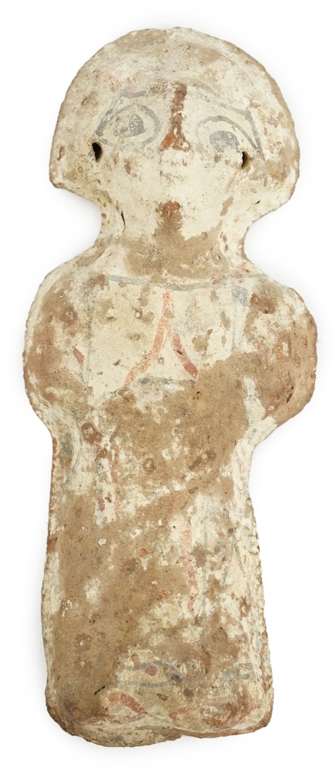 An Egyptian Coptic terracotta figure of a woman, probably 6th/7th century AD